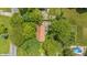 Overhead shot of brick house amidst lush greenery, showcasing a serene and private property at 5240 Southdale Dr, Indianapolis, IN 46217