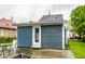 A backyard view showcasing a separate building with access door on the property at 529 E Merrill St, Indianapolis, IN 46203