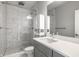 Modern bathroom features include a glass shower and vanity with great storage at 529 E Merrill St, Indianapolis, IN 46203