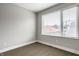 Bright bedroom featuring hardwood floors and a large window at 529 E Merrill St, Indianapolis, IN 46203