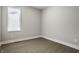 Cozy bedroom with hardwood floors, natural lighting, and neutral walls at 529 E Merrill St, Indianapolis, IN 46203