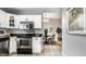 Modern kitchen with stainless steel appliances and white cabinets at 529 E Merrill St, Indianapolis, IN 46203