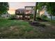 Spacious backyard featuring a multi-level deck and patio with ample seating at 5441 Ellsworth Dr, Plainfield, IN 46168