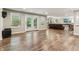 Finished basement space featuring wood floors, recessed lighting, and walkout access to the backyard at 5441 Ellsworth Dr, Plainfield, IN 46168