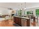 Well-appointed kitchen with granite countertops, stainless steel appliances, and seamless flow to the living area at 5441 Ellsworth Dr, Plainfield, IN 46168