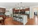 Spacious kitchen with granite countertops, stainless steel appliances, and a breakfast bar with seating at 5441 Ellsworth Dr, Plainfield, IN 46168