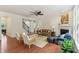 Spacious living room showcasing hardwood floors, a fireplace and comfortable seating arrangement at 5441 Ellsworth Dr, Plainfield, IN 46168