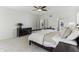Main bedroom featuring neutral carpet, a ceiling fan and views of the exterior at 5441 Ellsworth Dr, Plainfield, IN 46168