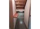 Basement hallway with exposed ceiling beams and potential for finishing at 5807 Sunwood Dr, Indianapolis, IN 46224