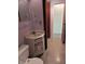 Vintage bathroom with retro fixtures and ample counter space and storage at 5807 Sunwood Dr, Indianapolis, IN 46224