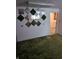Unique living area with moss art and open doorway to laundry room at 5807 Sunwood Dr, Indianapolis, IN 46224