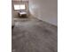 Open living room with carpet and adjacent dining area at 5807 Sunwood Dr, Indianapolis, IN 46224