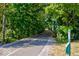 Scenic bike path surrounded by lush greenery, perfect for outdoor activities at 729 Greenford N Trl, Carmel, IN 46032
