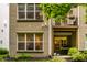 View of the home's exterior with a balcony and outdoor grilling area at 729 Greenford N Trl, Carmel, IN 46032