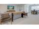 A living room featuring lots of natural light and comfortable seating as well as a small dining table at 729 Greenford N Trl, Carmel, IN 46032