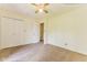 Bedroom with carpeted floor, double closets and a ceiling fan at 7405 N Janna Dr, Muncie, IN 47303