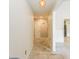 Hallway with tile flooring leading to the kitchen and other living spaces at 7405 N Janna Dr, Muncie, IN 47303