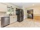 Kitchen features stainless steel appliances and a window with a view to the back yard at 7405 N Janna Dr, Muncie, IN 47303