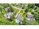 Overhead perspective of charming residences on tree-lined streets, featuring inviting pools at 7554 Silverpine Ct, Indianapolis, IN 46250