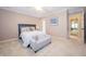 Charming bedroom featuring a queen bed, soft carpeting, and neutral decor at 7554 Silverpine Ct, Indianapolis, IN 46250
