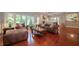 Comfortable living room with hardwood floors, plush furniture, and a cozy atmosphere at 7554 Silverpine Ct, Indianapolis, IN 46250