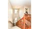 Grand entryway with wood railing and lots of natural light at 7733 Chestnut Eagle Ct, Zionsville, IN 46077