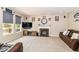 Relaxing living room with fireplace and entertainment center at 7733 Chestnut Eagle Ct, Zionsville, IN 46077