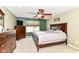 Spacious main bedroom with neutral colors, a ceiling fan, and nice furniture at 7733 Chestnut Eagle Ct, Zionsville, IN 46077
