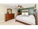 Large main bedroom with dresser, TV, and mirror at 7733 Chestnut Eagle Ct, Zionsville, IN 46077