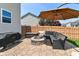Cozy patio featuring a fire pit, comfortable seating, and a built-in grill, perfect for outdoor entertaining at 7733 Chestnut Eagle Ct, Zionsville, IN 46077