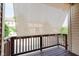 Balcony offering privacy screen and wood flooring overlooking the neighborhood at 8425 Codesa Way, Indianapolis, IN 46278