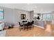 Open dining area with modern table and chairs, adjacent to a bright kitchen at 8425 Codesa Way, Indianapolis, IN 46278