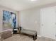 Entryway featuring stylish decor, including an abstract painting and a practical bench at 8425 Codesa Way, Indianapolis, IN 46278