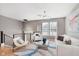 Cozy living room with sleek furniture, modern lighting, and stylish decor at 8425 Codesa Way, Indianapolis, IN 46278