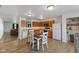 Eat-in kitchen featuring wood cabinets and stainless steel appliances plus open to the living room at 8447 Wanda Lake Dr, Camby, IN 46113