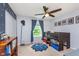 Inviting bedroom features a loft bed, ceiling fan, space themed decorations, and ample natural light at 8556 N Deer Hill Dr, McCordsville, IN 46055