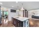 Spacious kitchen island perfect for Gathering gatherings and entertaining guests at 8556 N Deer Hill Dr, McCordsville, IN 46055
