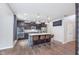 Beautiful kitchen featuring a granite island with modern appliances and stylish pendant lighting at 8556 N Deer Hill Dr, McCordsville, IN 46055