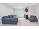 Comfortable living room with modern sofa and natural light from the window at 8556 N Deer Hill Dr, McCordsville, IN 46055