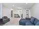 Upstairs loft with comfortable seating and plenty of room to relax at 8556 N Deer Hill Dr, McCordsville, IN 46055
