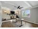 Inviting living room featuring a brick fireplace and large windows for natural light at 8635 Bishops Ln, Indianapolis, IN 46217