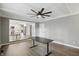 Spacious living room featuring a ceiling fan, recessed lighting and open layout at 8635 Bishops Ln, Indianapolis, IN 46217