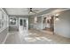 Sunroom with access to the kitchen and an outdoor patio at 8635 Bishops Ln, Indianapolis, IN 46217