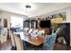 Spacious dining room features a large table, comfortable seating, and elegant decor at 9605 Treyburn Green Way, Indianapolis, IN 46239