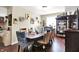 Elegant dining room with a large table, stylish chairs, and contemporary lighting fixtures at 9605 Treyburn Green Way, Indianapolis, IN 46239