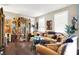 Inviting living room featuring hardwood floors, ample natural light, and stylish decor at 9605 Treyburn Green Way, Indianapolis, IN 46239