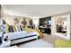 Spacious main bedroom featuring stylish decor, neutral walls, and plenty of natural light at 9605 Treyburn Green Way, Indianapolis, IN 46239