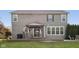 View of the home's exterior overlooking backyard wooden deck, gazebo and well manicured lawn at 9840 N Anchor Bnd, McCordsville, IN 46055