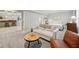 Cozy basement living room with comfortable seating, coffee table and access to bedroom at 9840 N Anchor Bnd, McCordsville, IN 46055