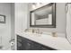 Well-lit bathroom with a gray vanity and stylish framed mirror at 9840 N Anchor Bnd, McCordsville, IN 46055